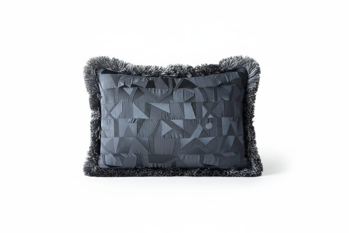 Geometric textured cushion with fringe trim